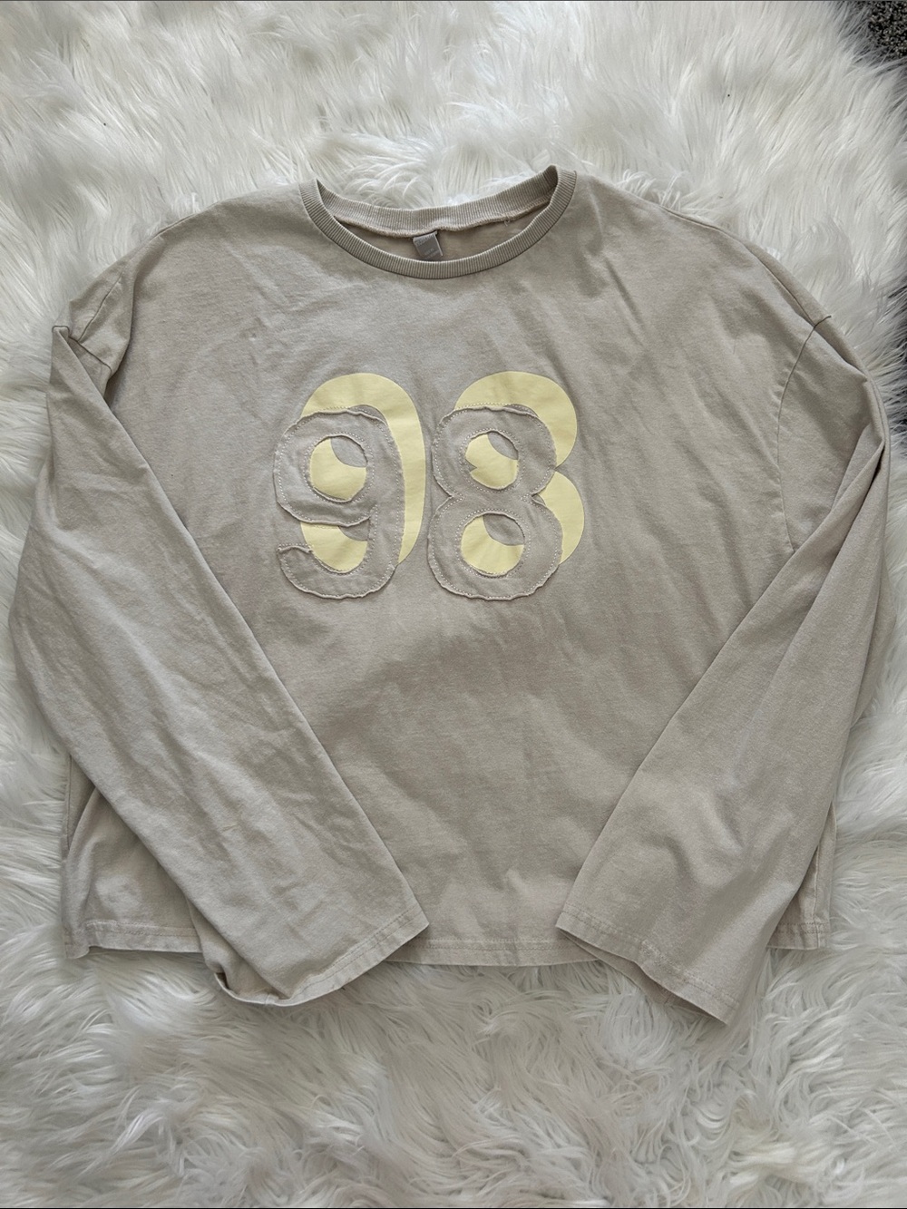 Beige Long-Sleeve Graphic Tee with Yellow '98'